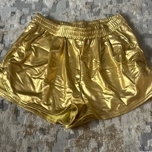 Gold shorts size small with pockets